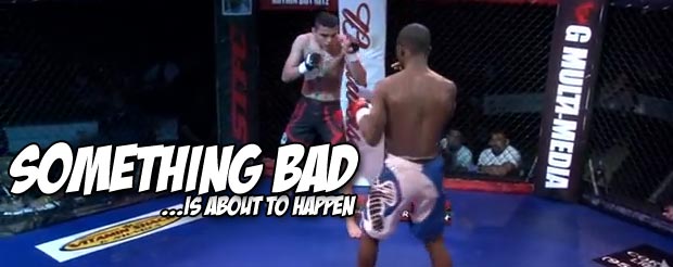 Watch this guy get head kicked so hard that he actually spins around