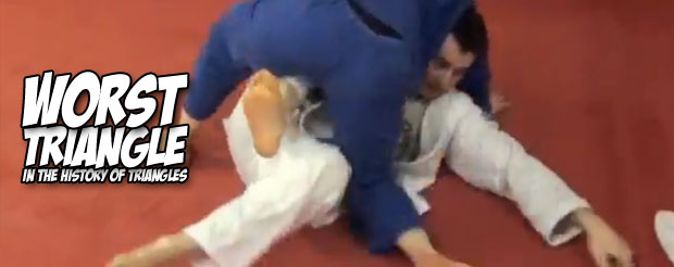 Guy proposes to his girlfriend while she's caught in his triangle choke, just watch it