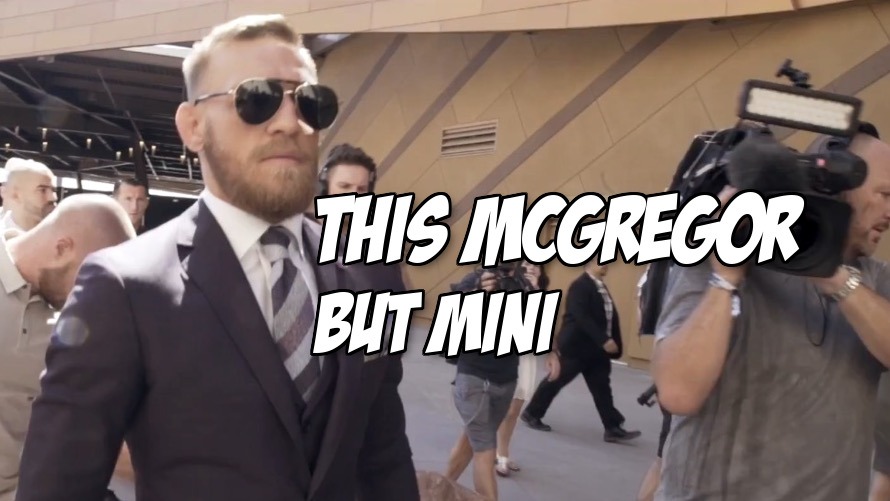 A very good picture of Conor McGregor Jr. in sunglasses and a $5,000 suit like his dad