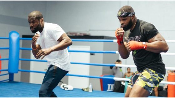 Image of Woodley and Mayweather Jr via Twitter