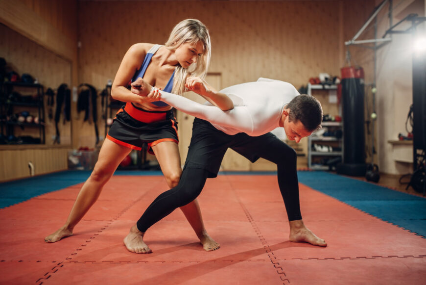 Woman Doing Elbow Kick For Self Defense Workout