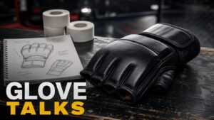 Black MMA glove on a gym table for UFC glove talks