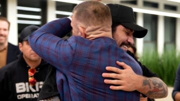 Dillon Danis embraces Conor McGregor in a photo tied to his public support for McGregor