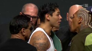 Ryan Garcia and Conor Benn are separated during their Fanatics Fest press conference