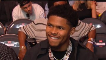 Shakur Stevenson sitting cageside at UFC 329