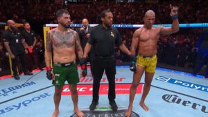 Gregory Rodrigues has his hand raised after beating Anthony Hernandez at UFC Sacramento