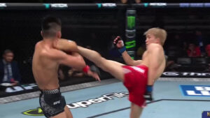 Kai Asakura lands a head kick on Aoriqileng at UFC Shanghai