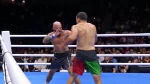 Julian Fernandez attacks Dan Podmore during their BKB 59 title fight in Tijuana