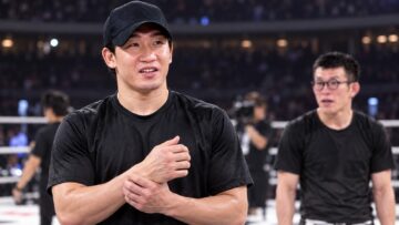 Mikuru Asakura supporting his right hand after competing at Super RIZIN 5