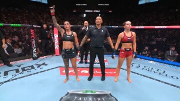 Nora Cornolle has her hand raised after beating Klaudia Sygula at UFC Paris
