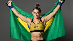 Norma Dumont poses with the Brazil flag before her UFC Vegas 121 fight with Ailin Perez