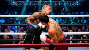 Ryan Garcia lands a body shot on Conor Benn during their welterweight title fight