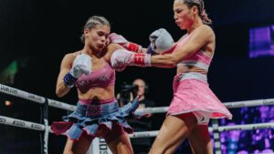 Carla Jade and Erika Night exchange punches during their Misfits Boxing title fight