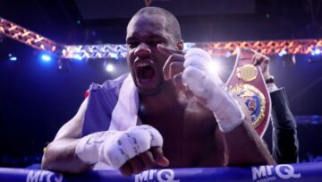 Daniel Dubois celebrating with his championship belt in an archive photograph