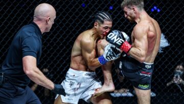 Jonathan Haggerty raises his knee against Hiroki Akimoto in their October17 kickboxing title bout