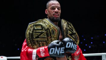 Regian Eersel holds his championship belts in April 2026