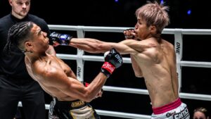 Taiki Naito lands a punch on Johan Estupinan in their ONE Championship fight