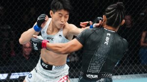 Wang Cong and Natalia Silva exchange punches at UFC 332