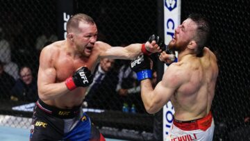 Petr Yan lands a punch on Merab Dvalishvili during their UFC 333 bantamweight championship fight in Abu Dhabi